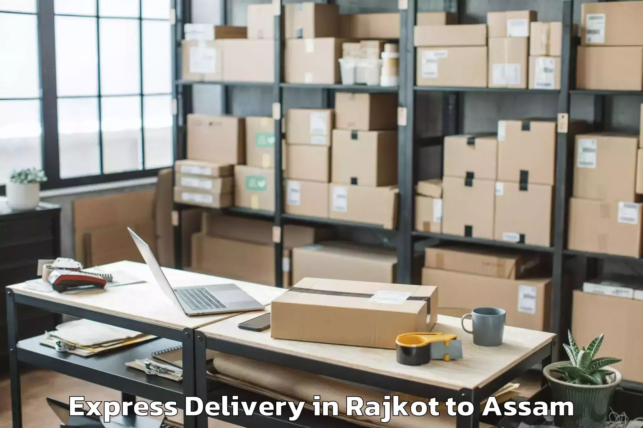 Rajkot to Goroimari Express Delivery